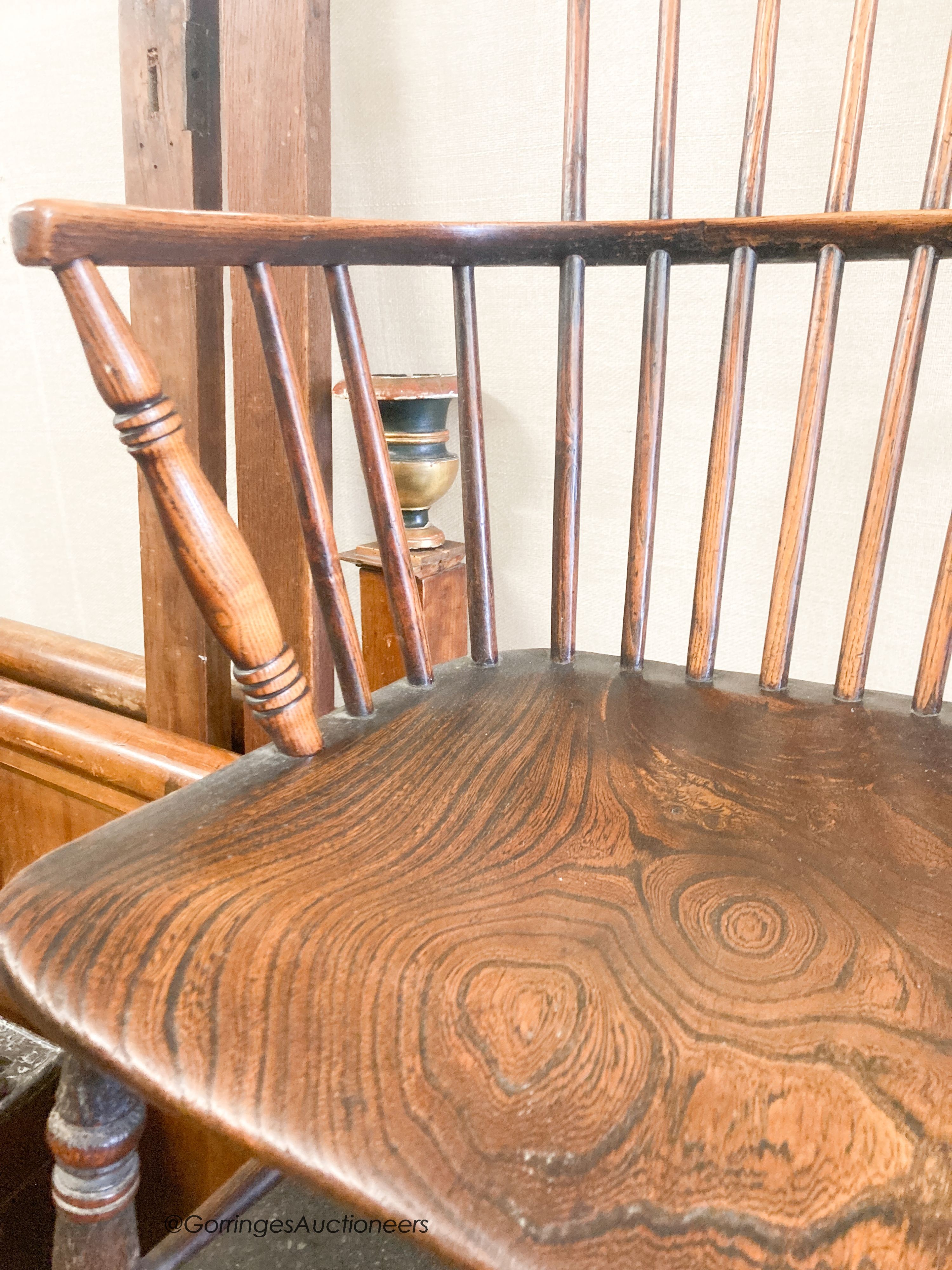 A 19th century elm and fruitwood Windsor comb back armchair, width 50cm, depth 40cm, height 96cm